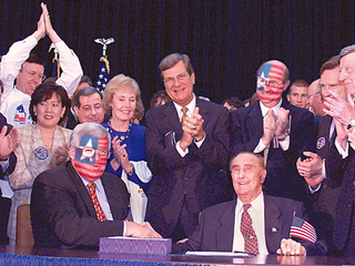 Members of Congress cheer the passage of the Helms-Bayh bill.